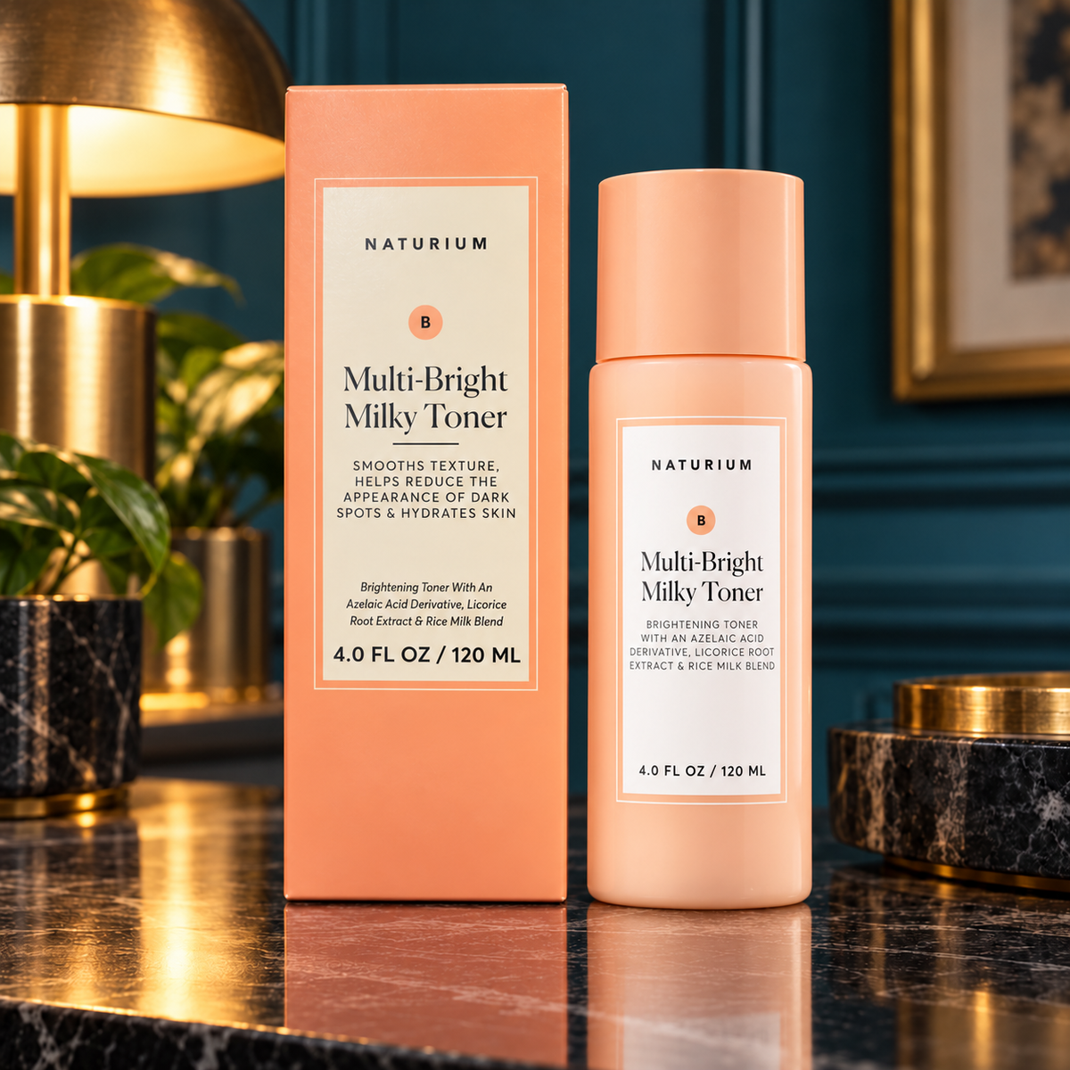 NATURIUM Multi-Bright Milky Toner 120 mL bottle beside its matching carton in a luxury teal and brass interior