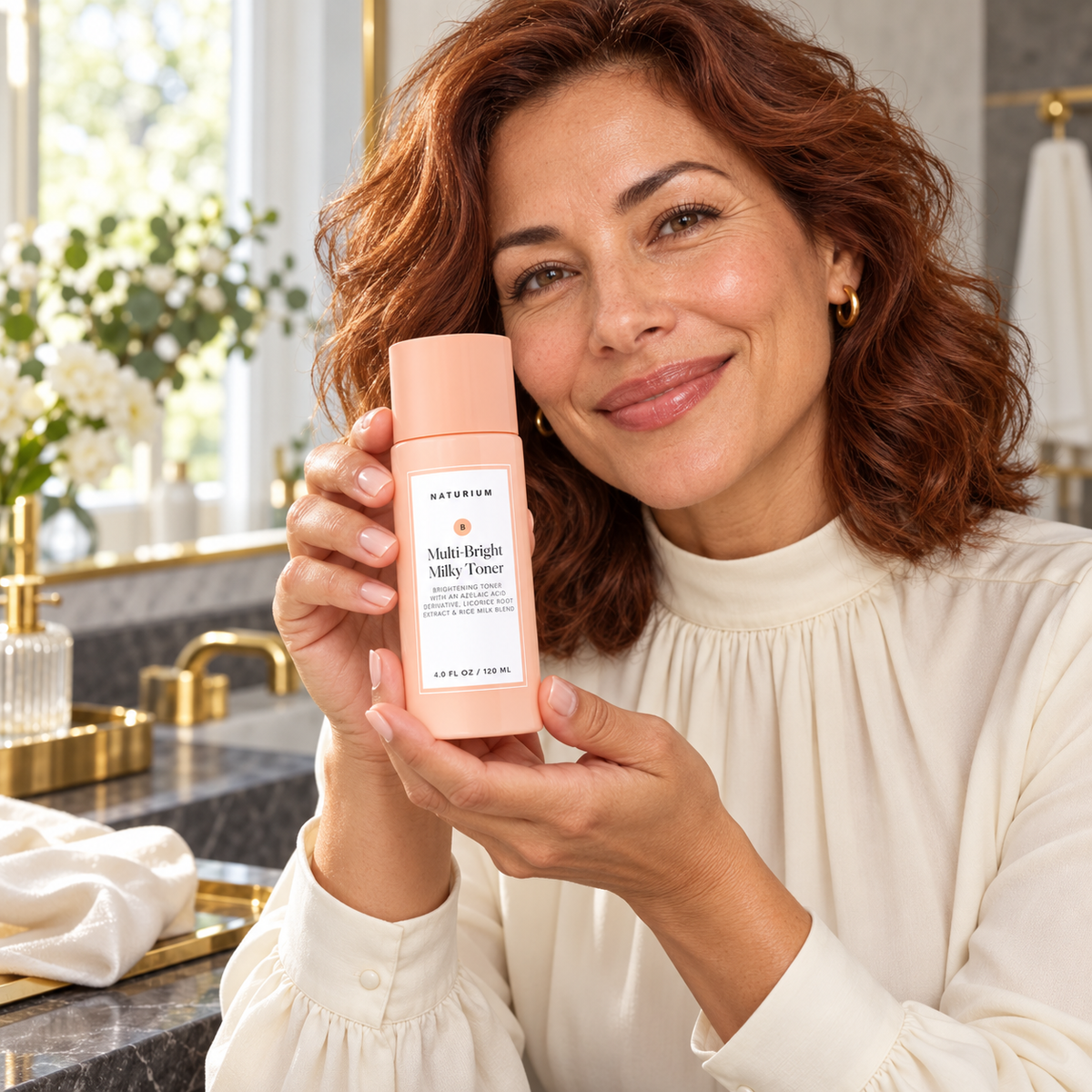 NATURIUM Multi-Bright Milky Toner 120ml — holding in a home routine.