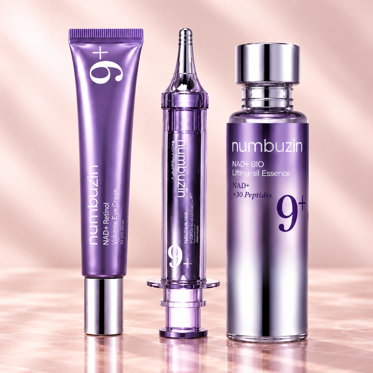 Three Numbuzin eye-care set containers on a champagne background, without promotional headline overlays