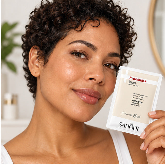 SADOER Probiotic Hydrating Facial Mask held by an adult woman