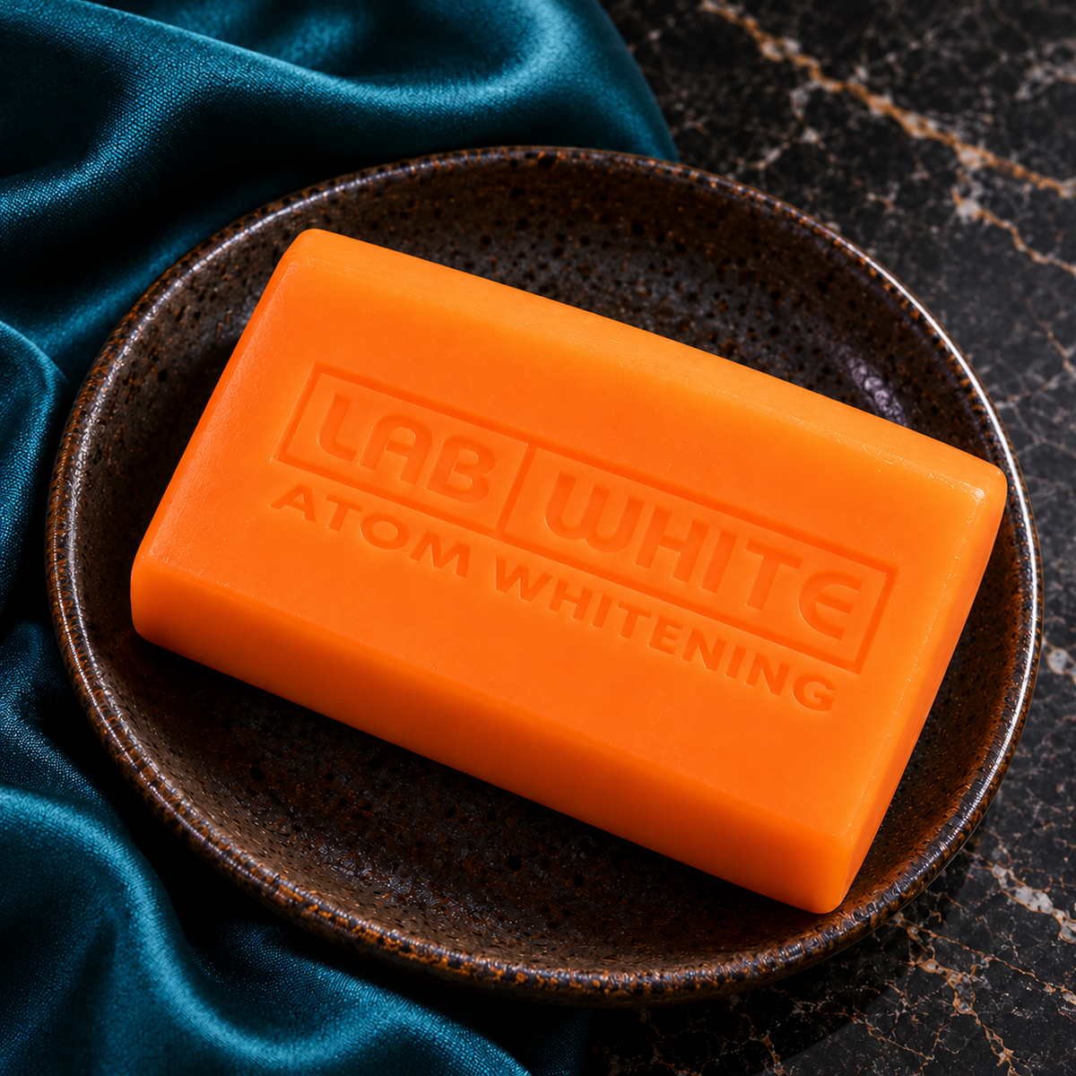 LAB WHITE Papaya Soap — close view of the orange rectangular bar and embossed label