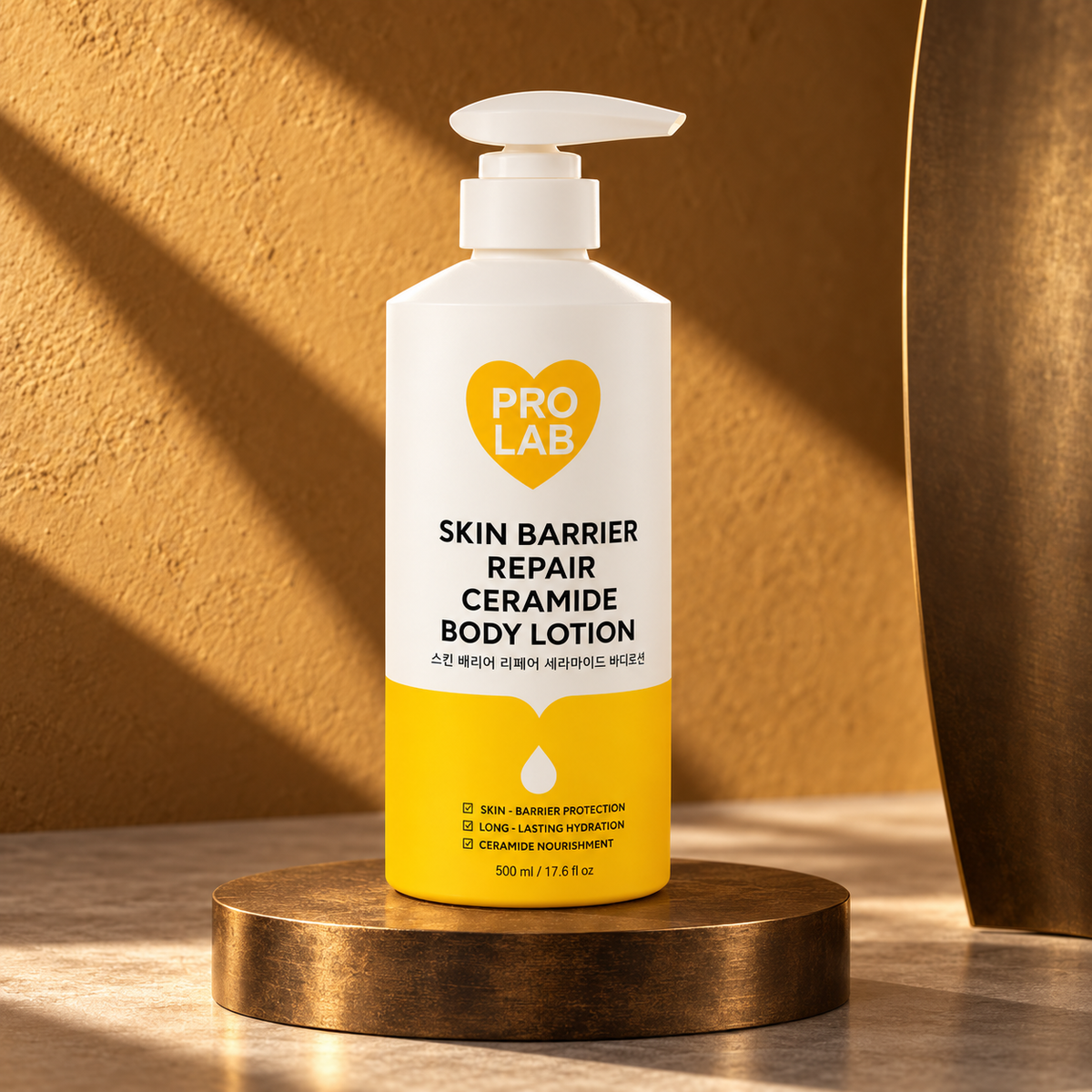 PRO LAB Ceramide Body Lotion 500 ml pump bottle on a bronze display with an ochre background; styled product photograph.