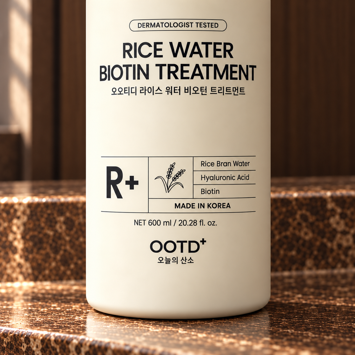 OOTD+ Rice Water Biotin Treatment 600 mL front label close-up on brown stone