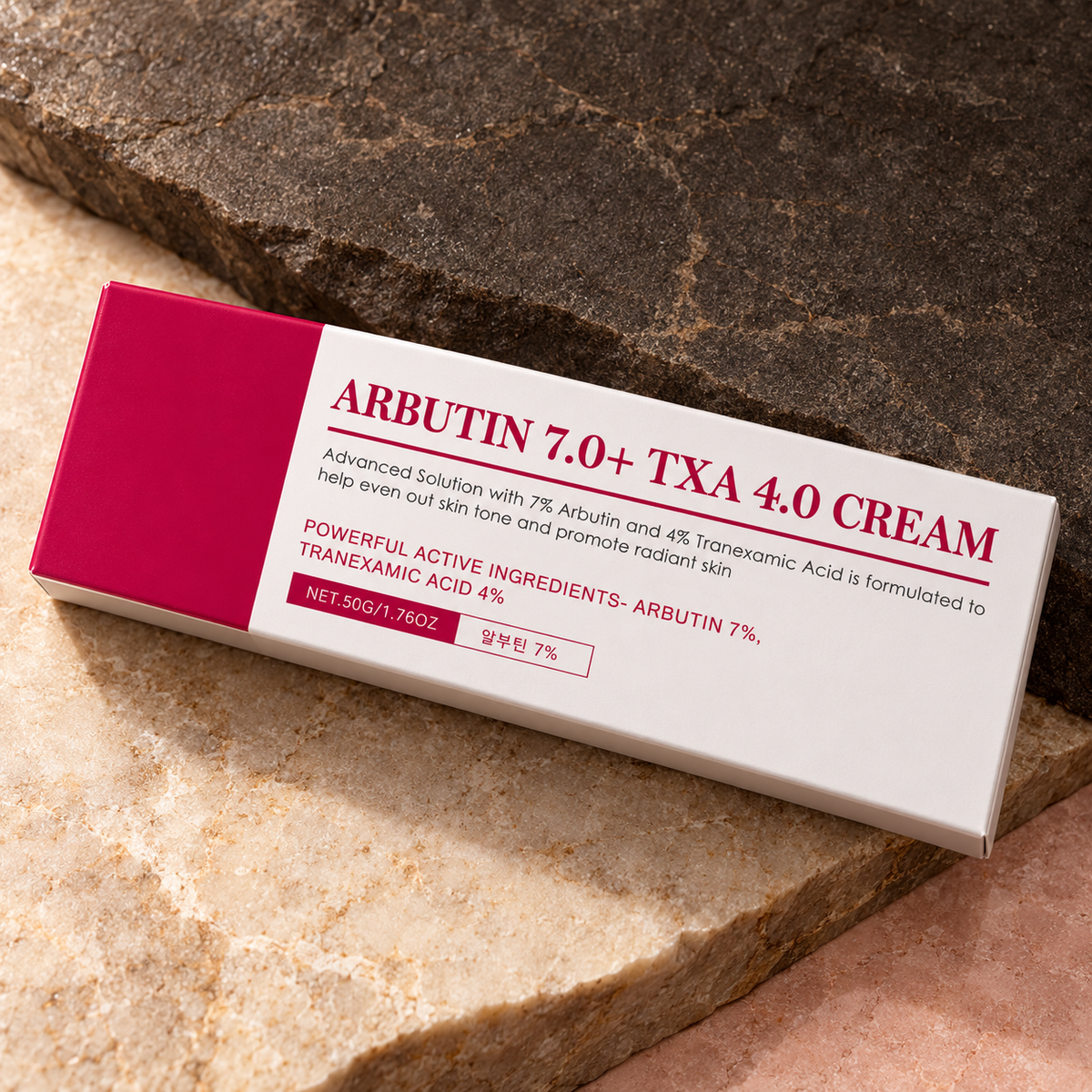 Unbranded Arbutin 7.0 + TXA 4.0 cream, 50 g carton lying diagonally on contrasting layered stone