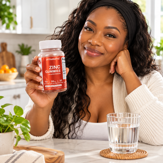 Black adult with Vitamatic Zinc Gummies during morning wellness routine